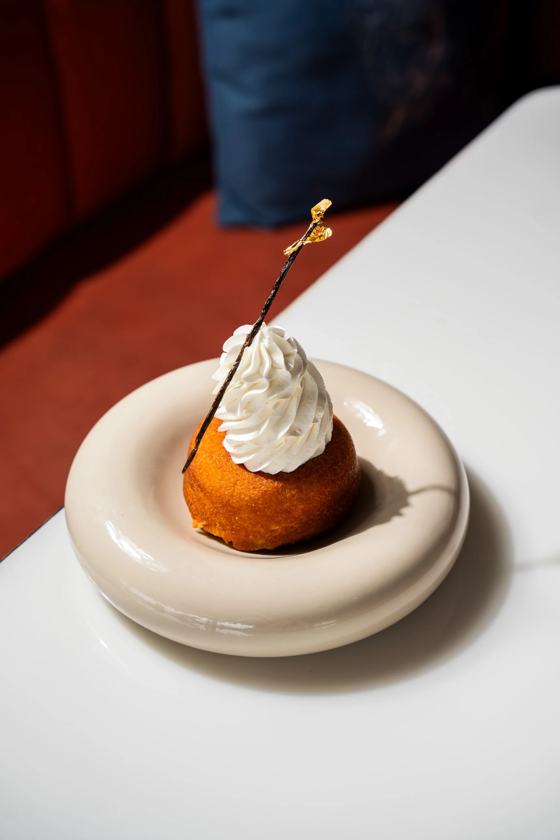 Picture of the Baba au Rhum desssert at pastel Rooftop, a mediterranean restaurant in Bangkok