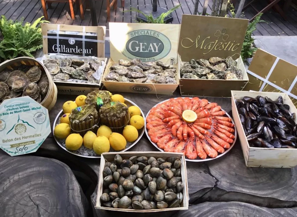 Here are oysters and seafood platters in the french restaurant of Le Cabanon in Bangkok.