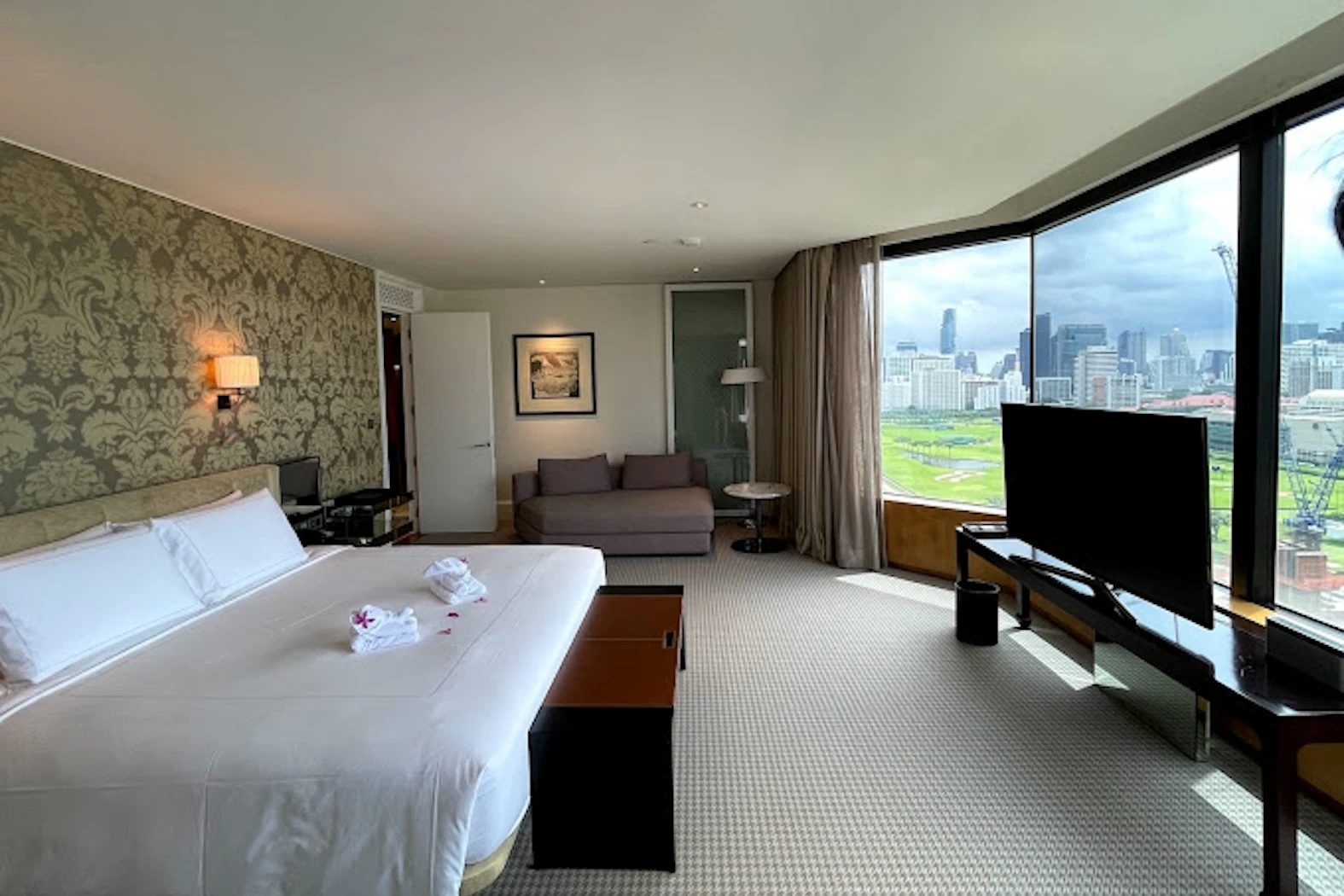 this is a suite room with a view of the Grand Hyatt Erawan hotel in Bangkok